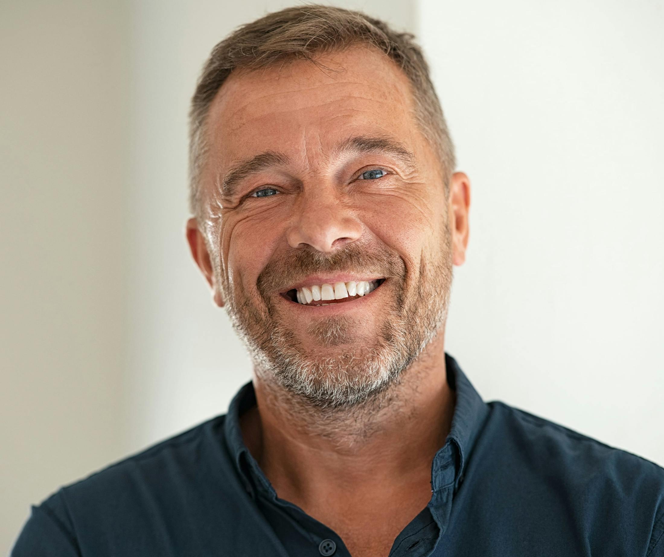 older man smiling